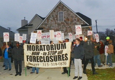 Occupy Detroit and Moratorium NOW rally to stop foreclosure at Detroit woman's home Dec. 6, 2011.