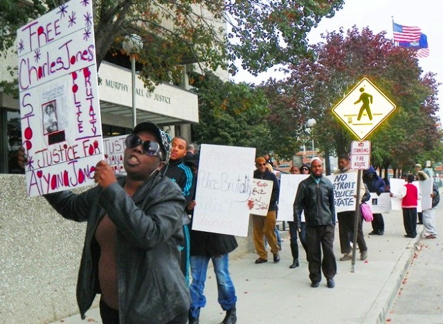Families and supporters of police victims including Aiyana Jones, Davontae Sanford, many others march at Frank Murphy Hall against new police regime Oct. 21, 2013.