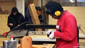 Youth at alternative prison woodworking shop in Germany.