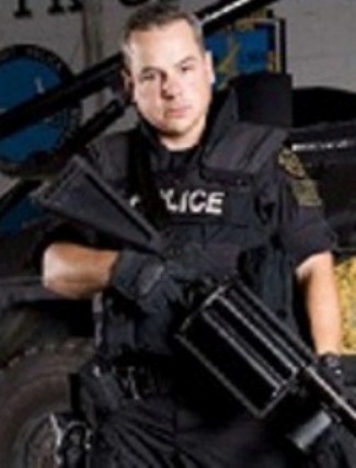 JKiller cop Joseph Weekley in star photo from A&E website.