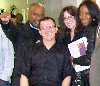 Roberto Guzman (center) with the late Kevin Carey (l) and members of the Detroit Crime Lab Task Force.