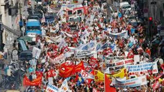 French workers have turned out in massive rallies all over the country to fight pension cuts by Hollande government. 