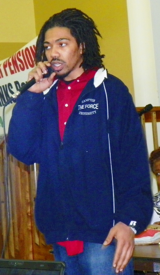 Youth gives presentation in solidarity with his elders and residents of Detroit.