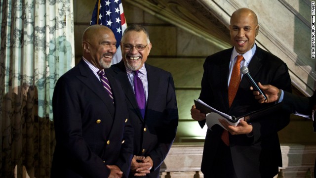 Cory Booker, then-Newark mayor, officiates a wedding ceremony for Joseph Panessidi and Orville Bell at City Hall early Monday, October 21, 2013. The New Jersey Supreme Court denied the state's request to prevent same-sex marriages temporarily, clearing the way for same-sex couples to marry in the state on October 21