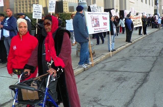Retirees protest cuts outside bankruptcy court April 1, 2014.