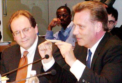 Joe O'Keefe of Fitch Ratings and Stephen Murphy of Standard and Poor's press $1.5 billion POC deal on City Council Jan. 31, 2005.