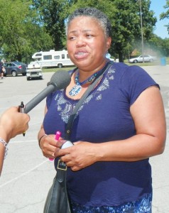Monica Lewis Patrick, former City Council candidate, is interviewed at rally to save Belle Isle Aug. 1, 2012