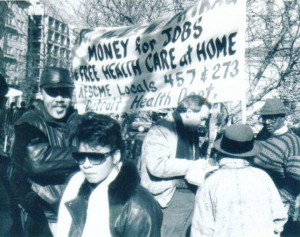 AFSCME Locals 457 and 273 from the now defunct Detroit Health Dept. marched in Washington against the first U.S. war on Iraq in 1991. Local 457 Pres. Al Phillips is at right being interviewed, member Denise Cranford (in hat) listens.