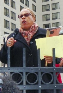 Attorney Alice Jennings speaks at rally v. bankruptcy April 1.