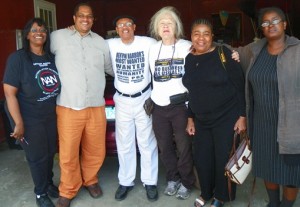 Detroiters Zelma Kinchloe, Cornell Squires, Cindy Darrah, Marcina Cole, and Kim Green visit with Rev. Pinkney at his home after rally.