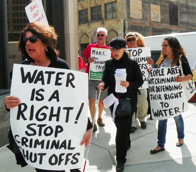 Marchers protest thousands of water shut-offs May 23 outside Water Board Building in downtown Detroit