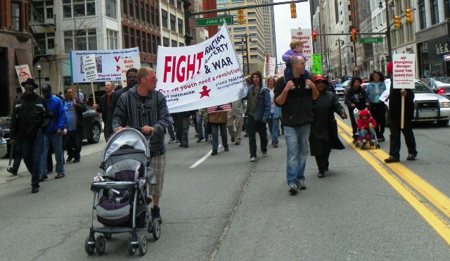 Detroit marchers with their babies take Woodward Ave.