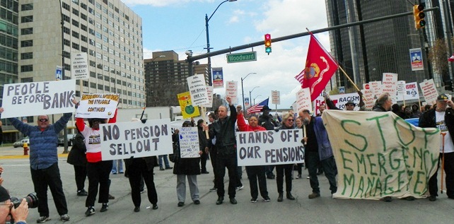 Detroit retirees and supporters blockaded downtown streets, banks and other facilities May 1, 2014 to protest bankruptcy deal.