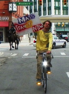 Protester on bicycle.