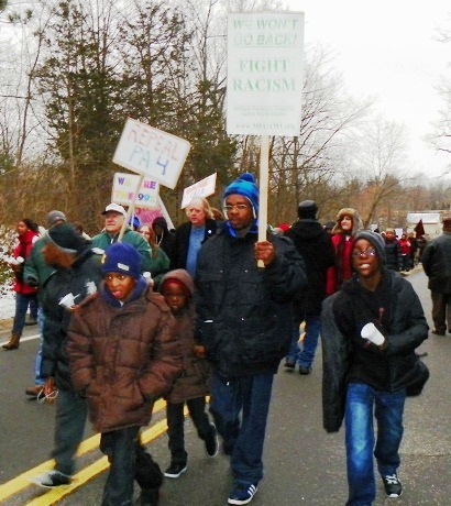 Thousands of marchers descended on Michigan Gov. Rick Snyder's home outside Ann Arbor on MLK Day, 2011 to demand an end to racist EM laws.