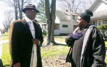 Benton Harbor Commissioner Marcus Muhammad, who is running for mayor against Hightower (l) talks with James Cornelius, who initiated recall campaign against Hightower. Final Call photo