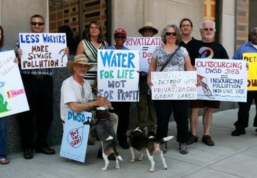 People's Water Board members protest earlier outside Water Board Building.