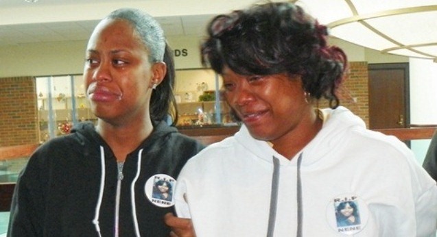 Renisha McBride's mother Monica McBride (r) and sister grieve after preliminary exam victory against her killer Theodore Wafer Dec. 19, 2013.