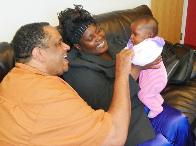 Cornell Squires with Tamikia McGruder and her baby Atjamino, kidnapped by CPS.