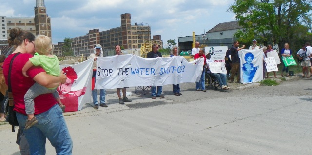 Protesters prepare for arrest at Homrich water shut-off facility July 18, 2014. 