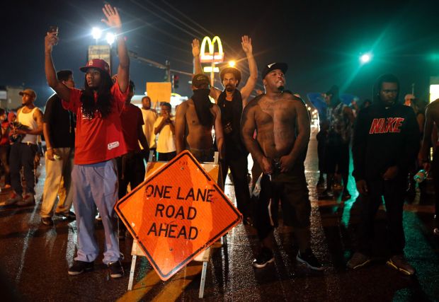 Ferguson protesters take the streets Aug. 15.