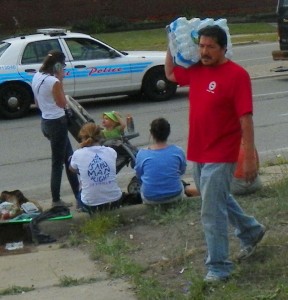 UAW member answers call to aid protesters, bringing water to Homrich blockade.