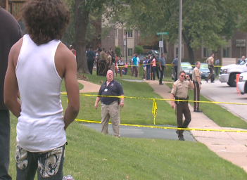 Teen from neighborhood of Michael Brown's grandmother watches as police cordon off scene.