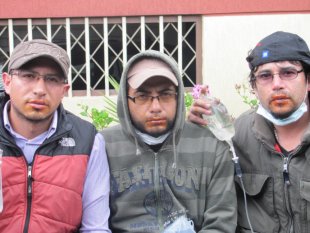 GM Colombia workers on hunger strike in 2012, with mouths sewed shut.