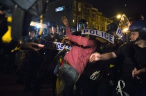 Baltimore police brutalize a demonstrator during the days of protest after Freddie Gray