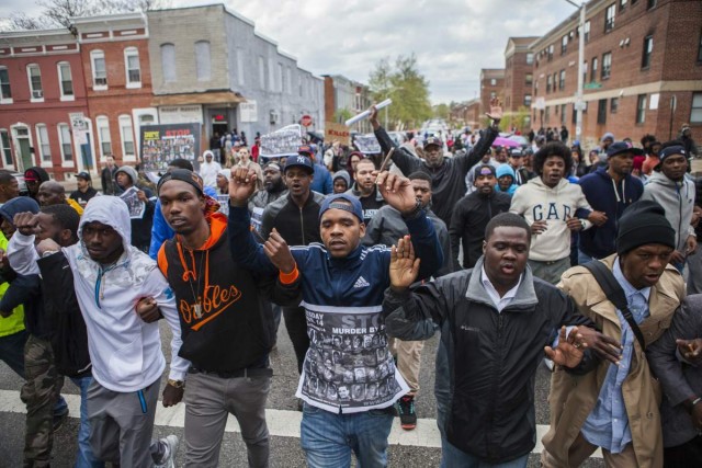 APRIL 22: Hundreds of people march through the streets of Baltimore to seek justice for the death for Freddie Gray who died from injuries suffered in Police custody in Baltimore, USA on April 22, 2015. (Photo by Samuel Corum/Anadolu Agency/Getty Images)