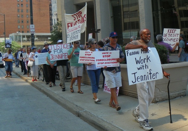 Protesters at Federal McNamara building call for Fannie Mae, financing arm of FHA to stop eviction of Jennifer Britt. Since the 2008 crash, most Detroit evictions are carried out by Fannie Mae and Freddie Mac.