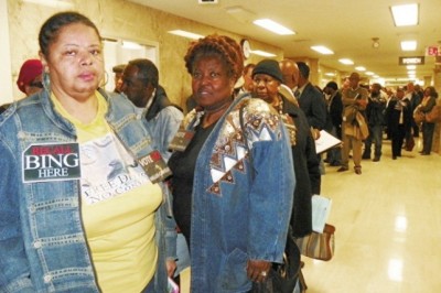 Sandra Hines, Lila Cabill, dozens line up in hallway outside Council chambers Nov. 20, 2012 after Pugh refused to move meeting to auditorium.
