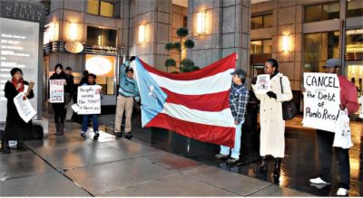 The Philadelphia-Camden Boricua Committee demonstrated Dec. 2, 2015 in front of the UBS Financial Services office in Philadelphia Center City, part of a national appeal by the New York Call to Action on Puerto Rico to demand the cancellation of Puerto Rico’s debt and expose the criminal role of the banks and financial institutions that impose brutal austerity measures on the residents of the island.