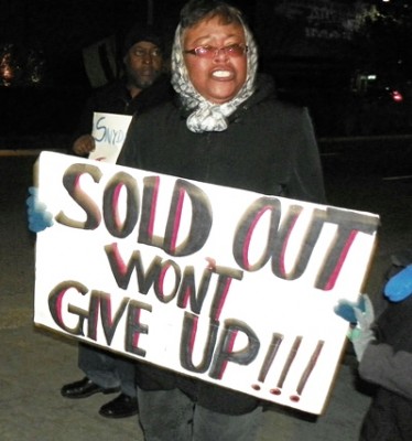 A coalition of protesters rallied outside the Detroit Institute of Arts.