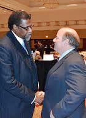 Darnell Earley, then Flint EM, with Detroit Mayor Mike Duggan during Michigan Municipal League convention, 2014.