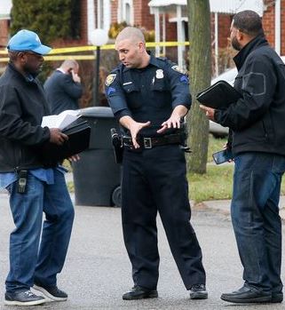 Is this the Dearborn cop who killed Matthews? At scene of shooting, he appears to be explaining action with his hands.
