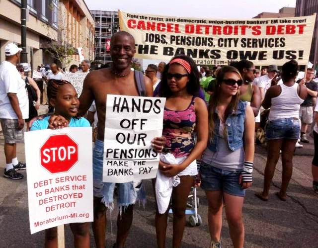 Former Detroit Water and Sewerage Dept. worker Derek Grigsby and family participate in protest against bankruptcy,