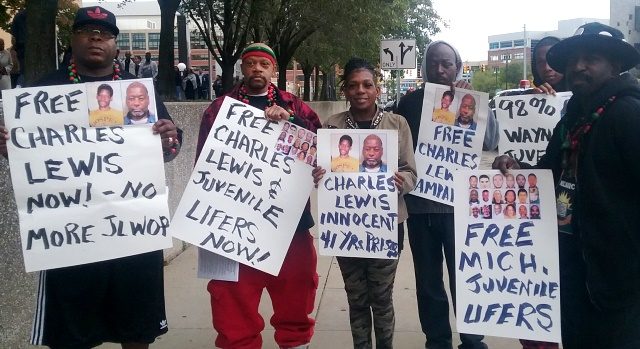 These supporters of Charles Lewis demonstrated for him during his Oct. 11 hearing.
