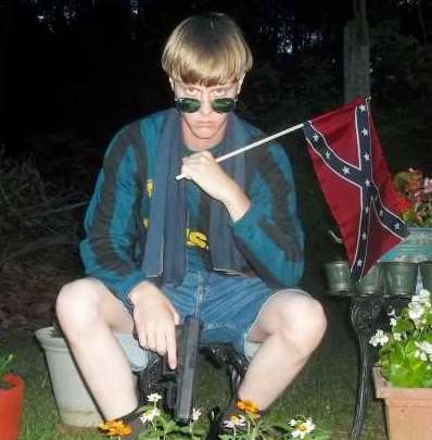 Dylan Roof in photo from racist website.