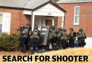 Ferguson cops raid home in manhunt for shooter who wounded two police.