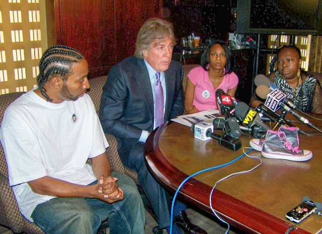 Atty. Geoffrey Fieger holds press conference May 27, 2010; l to r Aiyana's father Charles Jones, mother Dominika Stanley-Jones, grandmother Mertilla Jones (weeping), Both mother and grandmother have lost significant amounts of weight and experienced PTSD since that time,