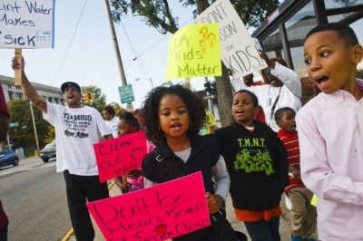 Flint kids join protest against poisoning of their city's water.