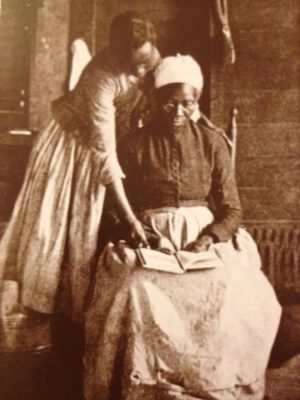 Kidnapped African woman learns to read after abolition of slavery. 