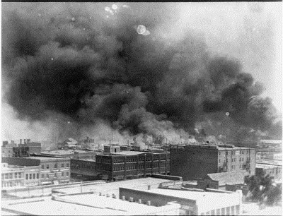 This is not Detroit in 1967; it is the Black Wall Street in the Greenwood neighborhood of Tulsa, Oklahoma in 1921, consumed by flames set by KKK members and other whites. Three hundred Black residents died, thousands of homes and business were forever destroyed.