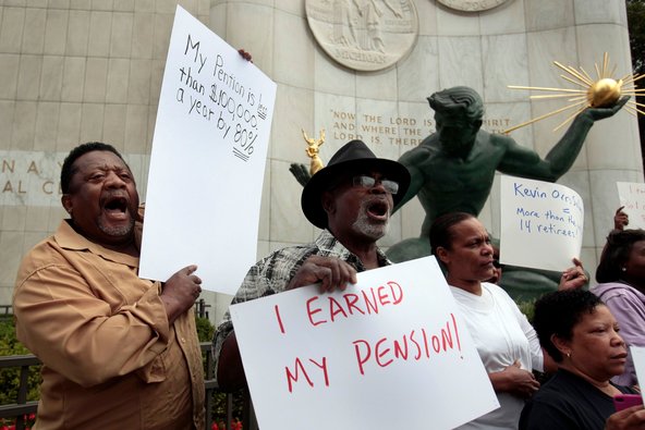 Detroit retirees protest outside Coleman A. Young Municipal Center.