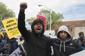 Protesters demand "Jail Killer Cops!"