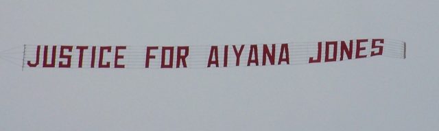 Justice for Aiyana Jones banner flies over her east-side Detroit neighborhood May 16, 2011.