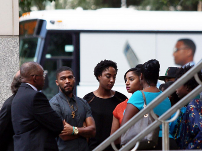 Family members of Keith Lamont Scott gather outside the Mecklenberg courthouse. Photo: The Independent.