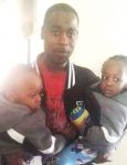 Kevin Matthews with young relatives/Facebook
