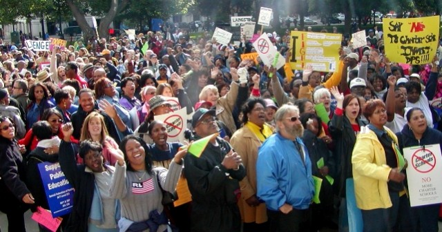Detroit Public Schools teachers walked out across the district in 2001 to rally in Lansing against bill that would have opened the way to more charter schools. They succeeded for the time being, only to face the devastation to come. 